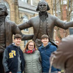 Family captures moment with George and Tom.